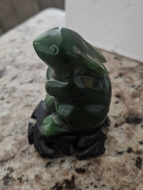 Green Stone Polished Rabbit Figurine On Wooden Piece